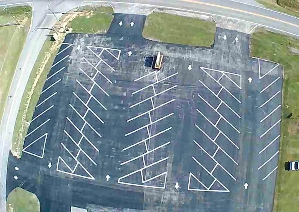 Finished commercial parking lot with fresh striping